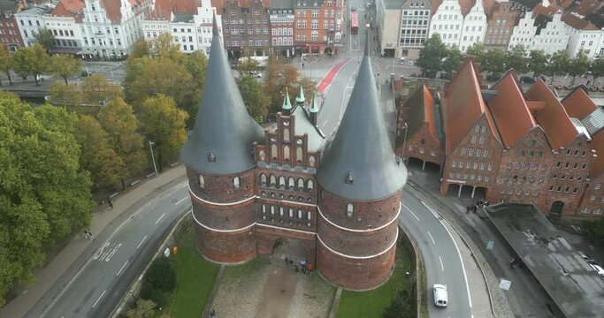 drone footage of the L&uuml;beck "Holstentor" in germany.  Surrounding