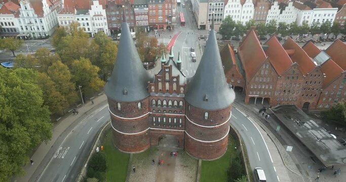 drone footage of the L&uuml;beck "Holstentor" in germany.  Surrounding