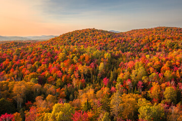 Aerial view of winding river in Laurentian mountains, Quebec, Canada during the fall