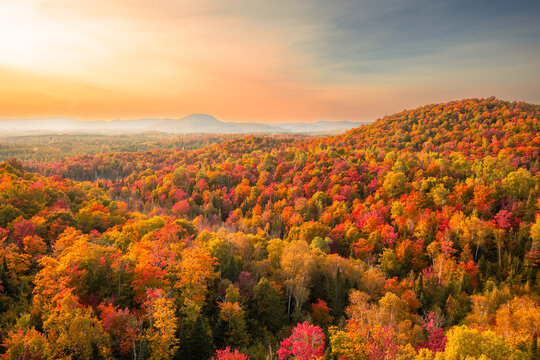 Aerial view of winding river in Laurentian mountains, Quebec, Canada during the fall foliage