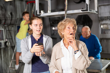 Teenager granddaughter, together with her grandmother, unravel another secret in the quest room