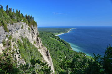 Fototapeta na wymiar Eastern canadian landscape Forillon national park cap bon ami area. Where mountains cliff meets sea. Saint-Lawrence gulf. Gaspesie seascape.