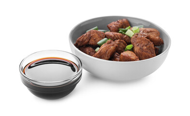 Tasty soy sauce and roasted meat isolated on white