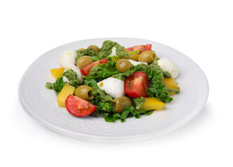 Delicious salad with pesto sauce isolated on white