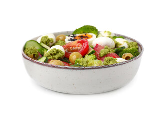 Delicious salad with pesto sauce in bowl isolated on white