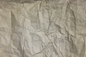 Texture of crumpled parchment paper as background, top view