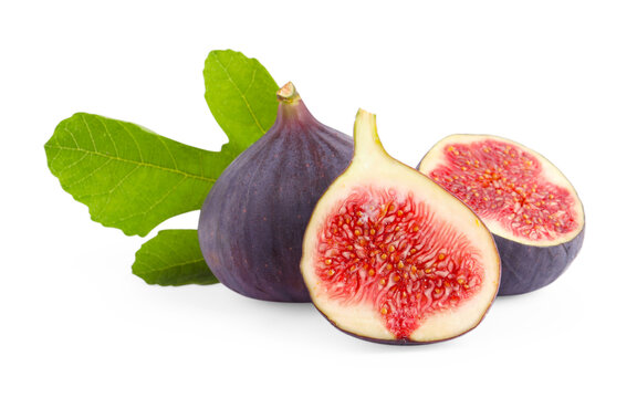 Whole and cut ripe figs with green leaf isolated on white