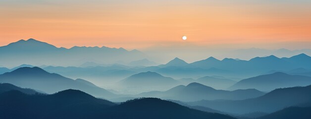 A breathtaking mountain range illuminated by the setting sun