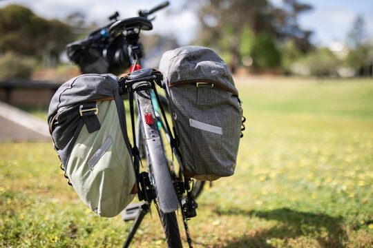 Bike riding cycle ride pannier bags bikepacking travel explore grass holiday 