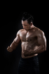 Fototapeta na wymiar portrait of a muscular man bobybuiling