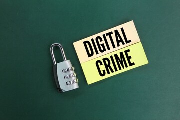 key and colored paper with the word digital crime. the concept of security in cyberspace. cyber security concept