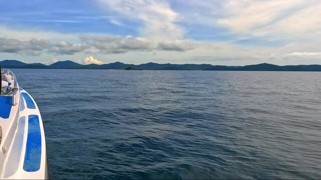 Phi Phi island off the coast of phuket thailand. Phi phi island is famous for turquoise clear blue waters teaming with Corel reef fish white soft sand and lush green trees.