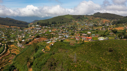 Aerial view of Houses and buildings on the slopes of the mountains in the town of Nuwara Eliya. Sri Lanka.