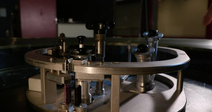 Close up of 70mm IMAX film being threaded through an IR feed unit.