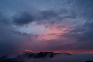 Pink clouds in the mountains