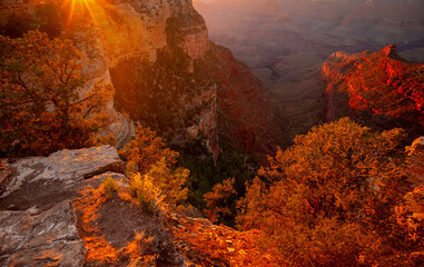 Grand Canyon north rim at sunset, Arizona. Red rock canyon, rocky mountains. Rock of the canyon,...
