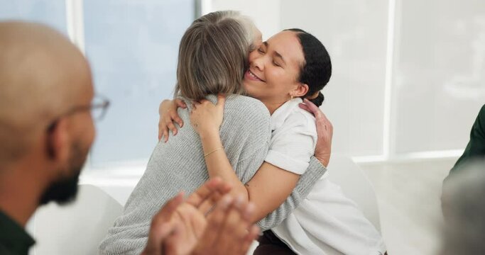 Clapping, group or women hug for support of friends for counselling, therapy or mental health. Psychology, stress management or happy people in circle together for trust, healing or help at workshop