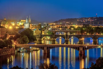 Fotobehang Karelsbrug View of Prague with the bridges over the river Vltava at night
