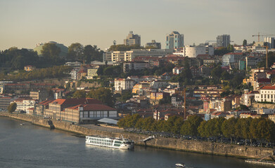 Obraz premium Landscape photo with Porto from above. Aerial view over this beautiful city from Portugal during a summer sunset.