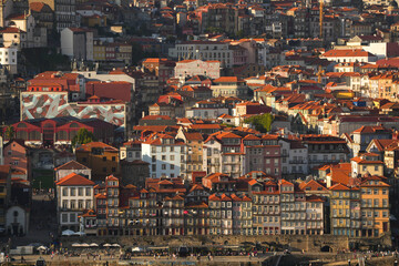 Fototapeta na wymiar Landscape photo with Porto from above. Aerial view over this beautiful city from Portugal during a summer sunset.