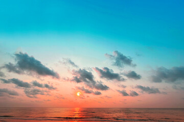 Sunrise horizon cool sea background on horizon tropical sandy beach; relaxing outdoors vacation	 - 663629115