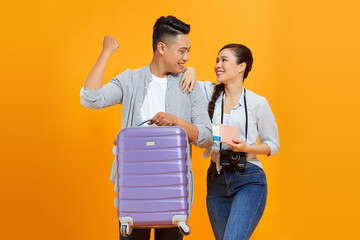 Young Asian couple happily traveling together