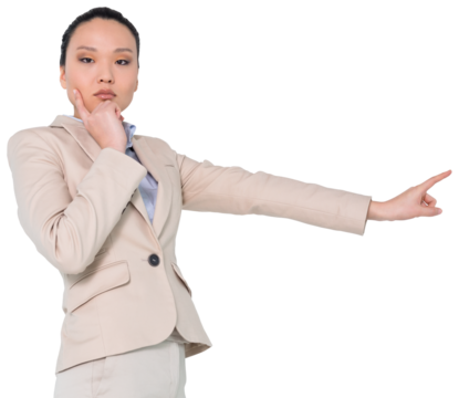 Digital png photo of serious asian businesswoman pointing finger on transparent background