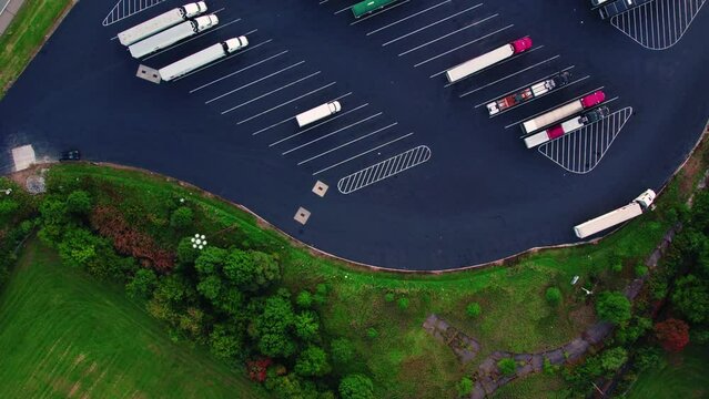 top down aerial of Service Plaza in Elkhart Indiana USA. Truck rest stop for semi truck and trailers. CDL drivers can fuel up, Rest stop for any traveler, can shower and eat. Indiana Toll Road I-80