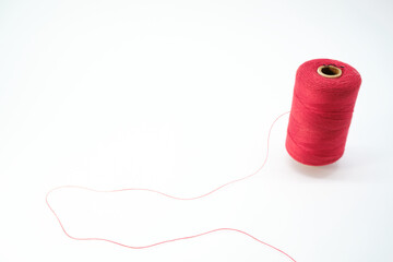 赤色のミシン糸のイメージ素材 - obrazy, fototapety, plakaty