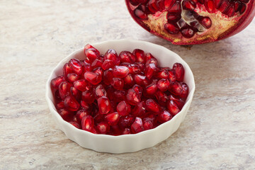 Ripe red Pomegranate seeds in the bowl