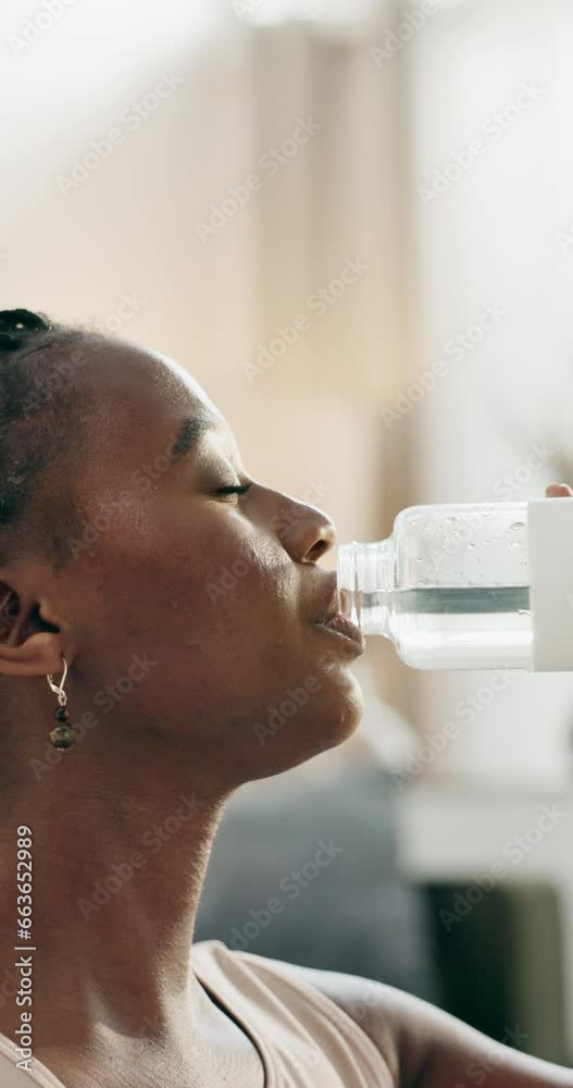 Canvas Prints Break, fitness and black woman drinking water in a house from a bottle from training or for clean diet. Healthy, sports and an African girl with a drink for nutrition, exercise or relax after workout