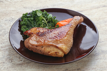Roasted duck leg with orange sauce