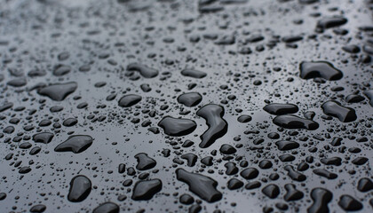 rain raindrops on the floor of car paint.