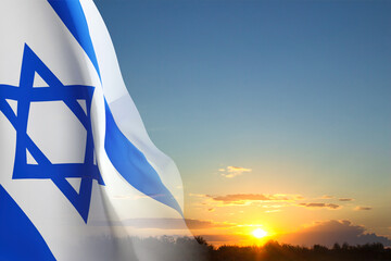 Israel flag against the sunset