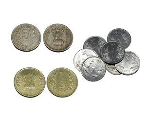 five rupees coin, and ten rupees coin, and 1 rupees coins. o white background. Rupees, Indian Currency coins money, business real estate concept.