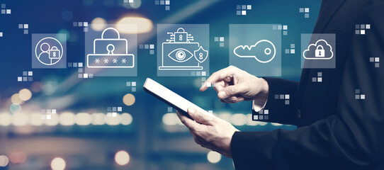 Data Privacy concept with businessman using a tablet computer