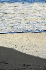 Fototapeta na wymiar beach coast surf at sunset detail mediteran sea kalymnos greece