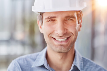 portrait of a confident businessman in a protective helmet