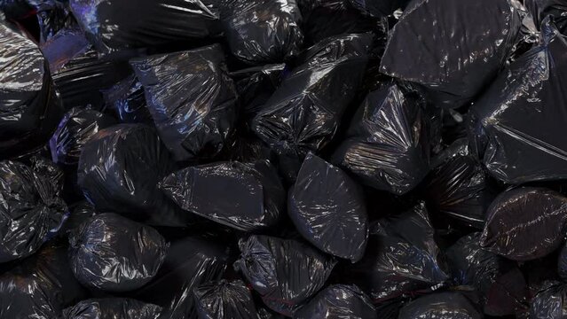Falling Garbage Bags Transition effect with alpha channel. 3D rendering.