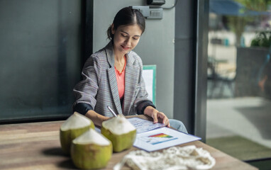 Cafe owner fosters circular economy with recycled materials, optimization, CO2 reduction, solar roof