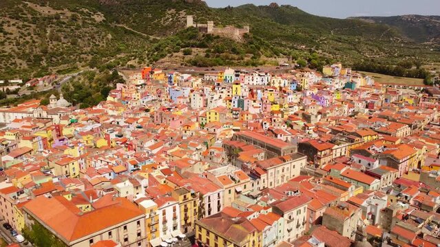 Aerial view of Bosa town, colorful houses in Sardinia, bird's view, day