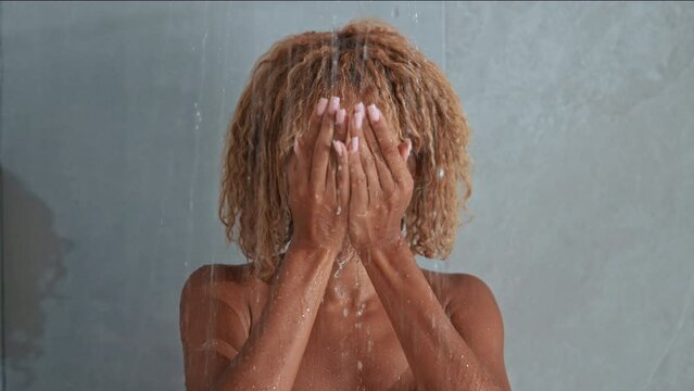 portrait happy smiling woman washing face taking shower happy morning slow motion