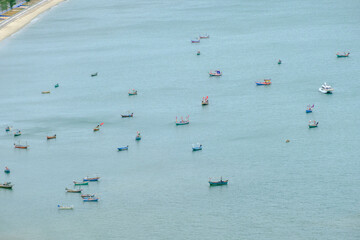 A sea with fishing boats near the shore