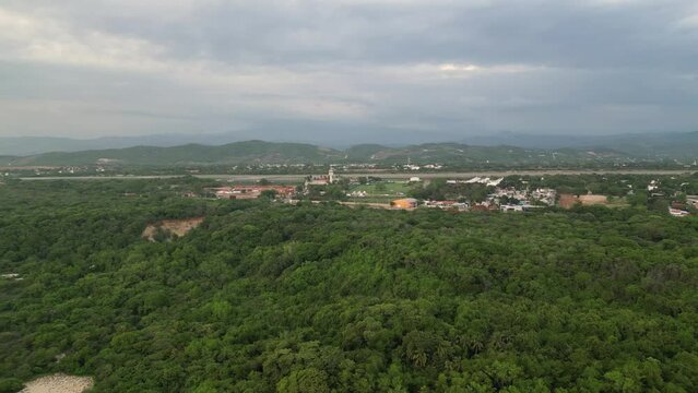 Shows an aerial view of Puerto Escondido International Airport, Oaxaca