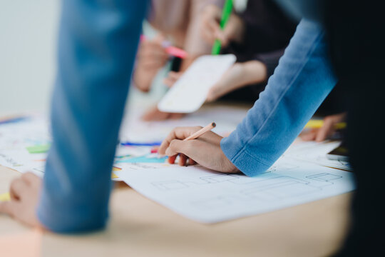 Team of Creative Web, Graphic Designer planning for mobile phone, drawing website ux ui app for mobile phone application and development template layout, process to developing prototype wireframe.