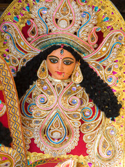 Decorated idol of Hindu Goddess Durga with use of selective focus