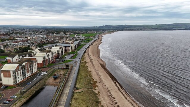 Aerial view of beautiful homes situated on the stunning coastline of Ayr, Scotland
