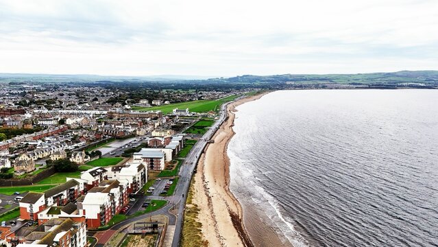 Aerial view of beautiful homes situated on the stunning coastline of Ayr, Scotland