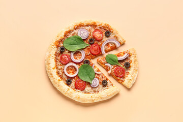 Tasty pizza with basil and tomatoes on beige background