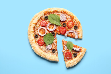 Tasty pizza with basil and tomatoes on blue background